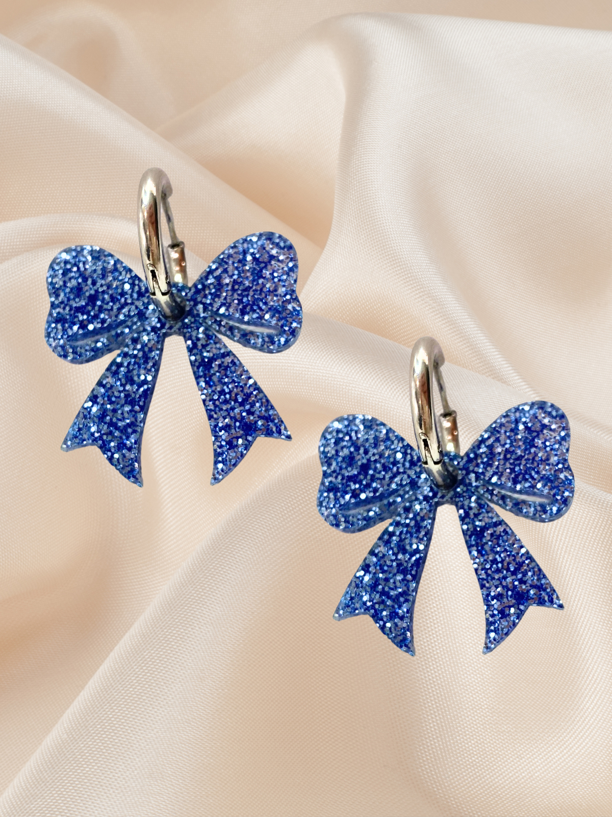 Bow Hoop Dangle Glittery Blue